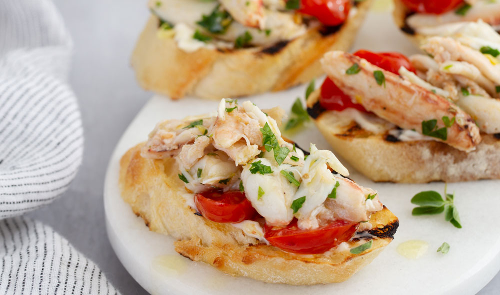 Buttery Garlic Crab Bruschetta Aqua Star